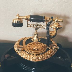 Jewelry and musical old fashioned telephone box